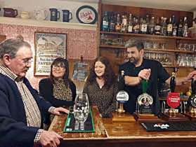 Club Chairman explains to the staff how the vase works